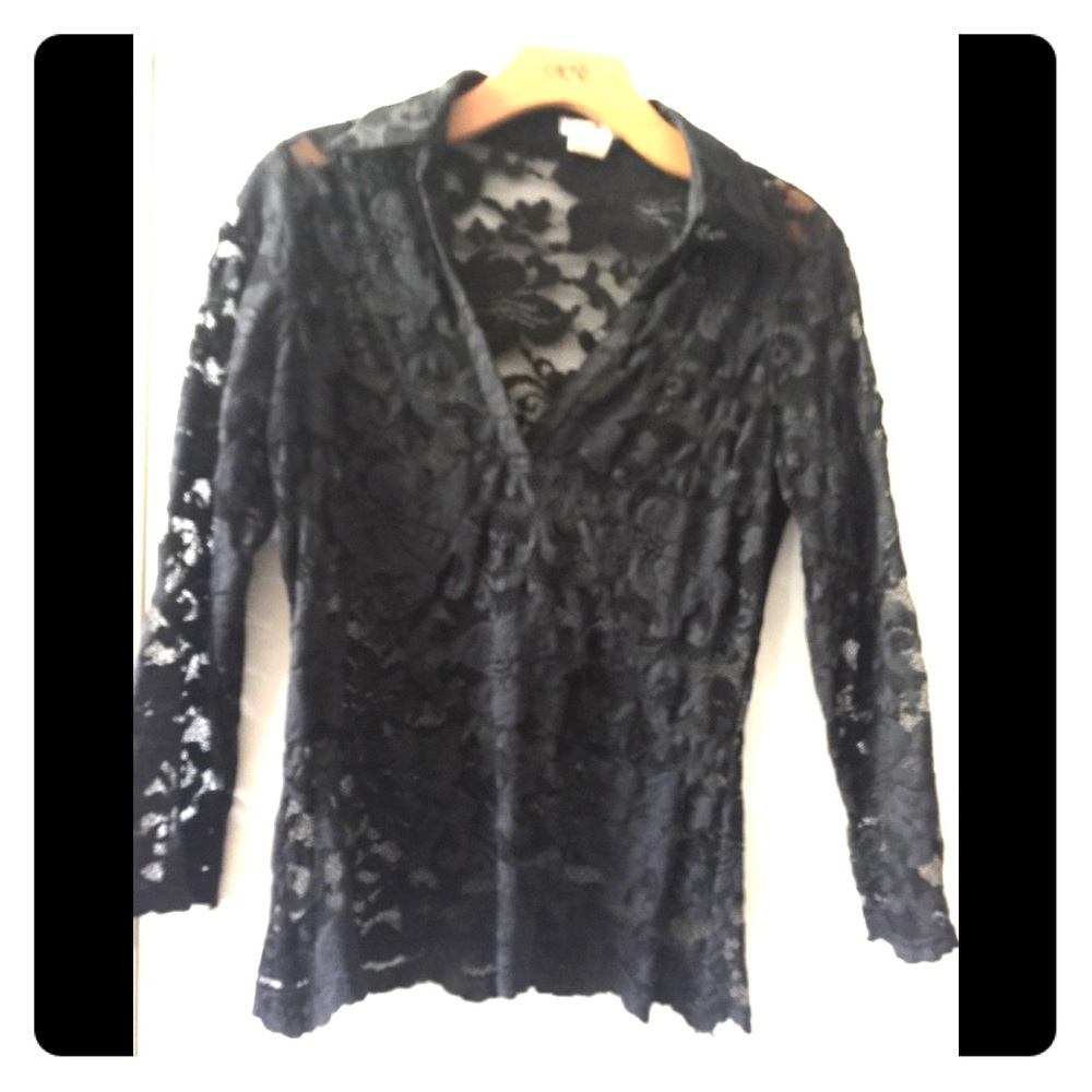 Cache lace, sheer black shirt.